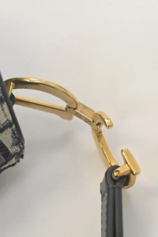 Navy Oblique canvas and leather saddle bag