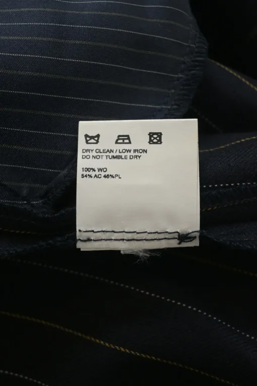 Navy pinstripe wool pull-on low-rise skinny flare tailored trousers