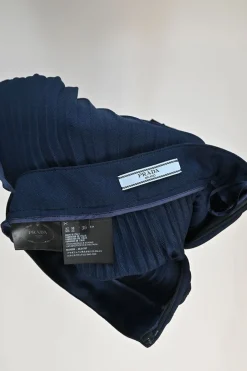 Navy polyester twill plissé A-line skirt with belt loop waistband