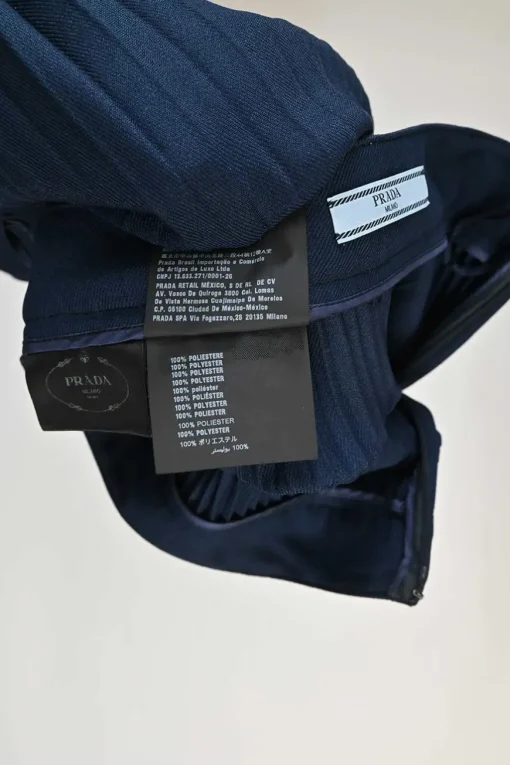 Navy polyester twill plissé A-line skirt with belt loop waistband