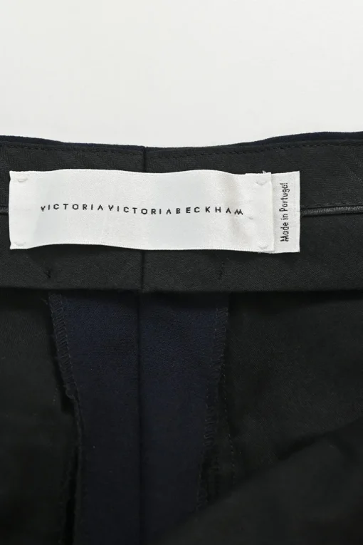 Navy pull-on mid-rise flared tailored trousers