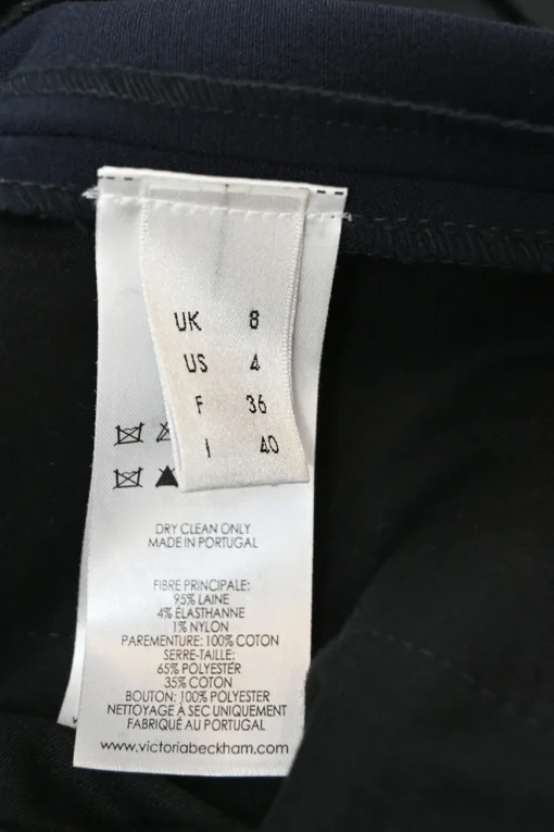 Navy pull-on mid-rise flared tailored trousers