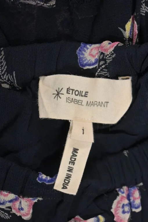 Navy raw-edge viscose floral print short sleeve peplum blouse and pull-on tiered ruffle mini skirt two-piece set
