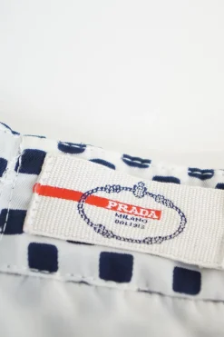 Navy resin-coated nylon graphic square print pleated mini skit