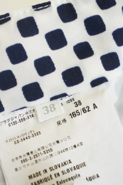 Navy resin-coated nylon graphic square print pleated mini skit