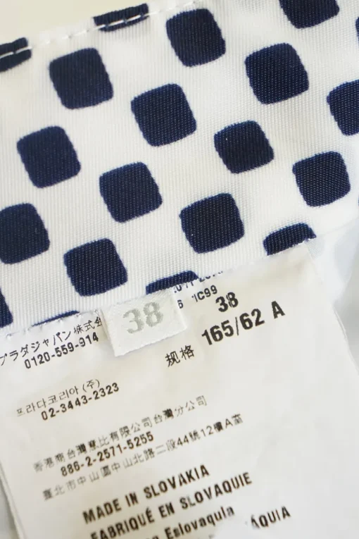 Navy resin-coated nylon graphic square print pleated mini skit
