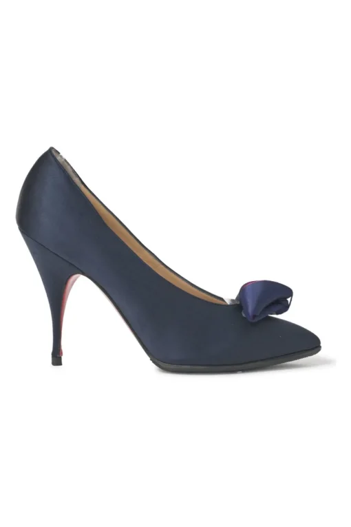 Navy satin pointed toe pumps featuring pillowed top accents