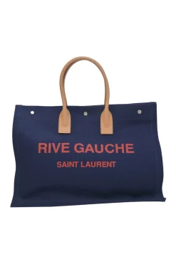 Navy screen-printed cotton-blend canvas and leather Rive Gauche tote bag
