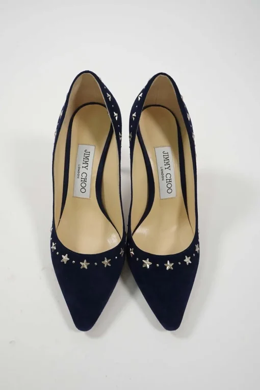 Navy star-studded suede and leather pointed toe pumps