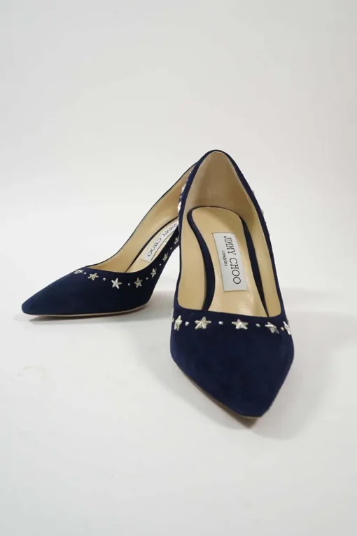 Navy star-studded suede and leather pointed toe pumps