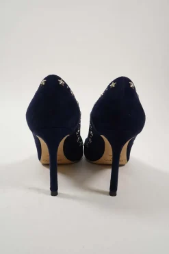 Navy star-studded suede and leather pointed toe pumps