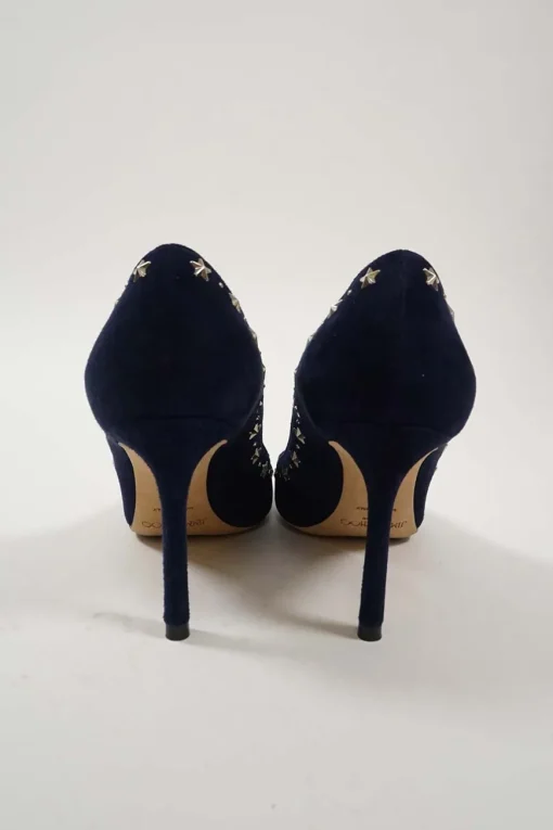 Navy star-studded suede and leather pointed toe pumps