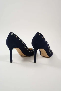 Navy star-studded suede and leather pointed toe pumps