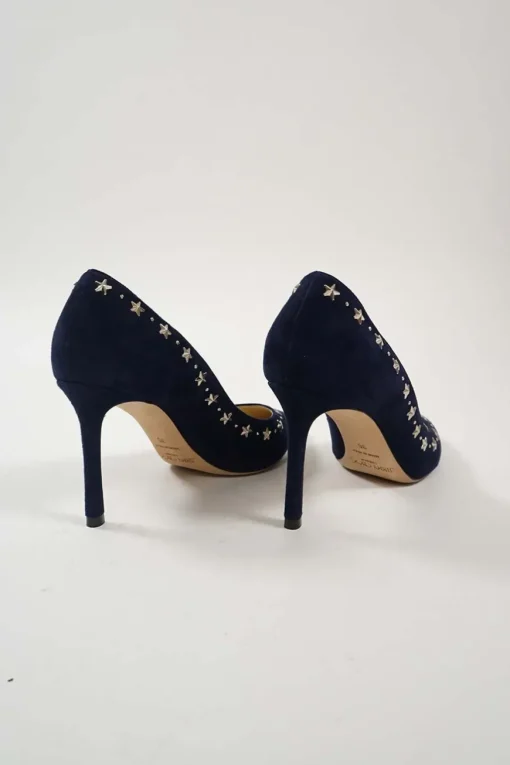 Navy star-studded suede and leather pointed toe pumps