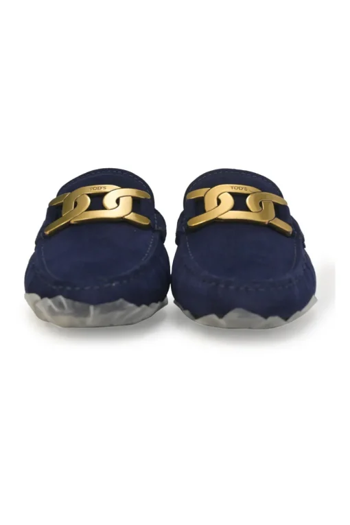 Navy suede Kate round-toe slip-on driving loafers with branded chainlink vamp buckle appliqué and signature Gommino soles