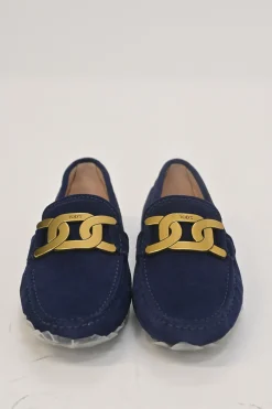 Navy suede Kate round-toe slip-on driving loafers with branded chainlink vamp buckle appliqué and signature Gommino soles