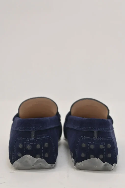Navy suede Kate round-toe slip-on driving loafers with branded chainlink vamp buckle appliqué and signature Gommino soles
