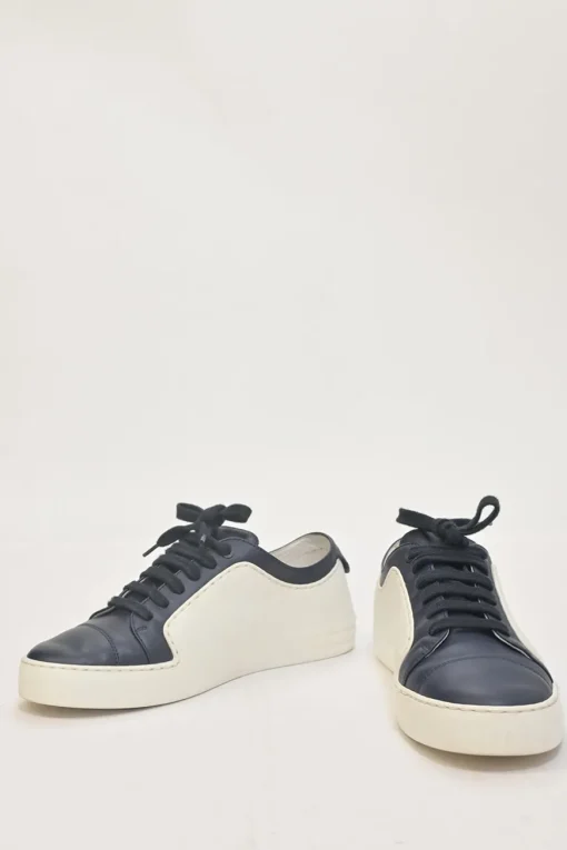 Navy two-tone leather and rubber low-top CC sneakers