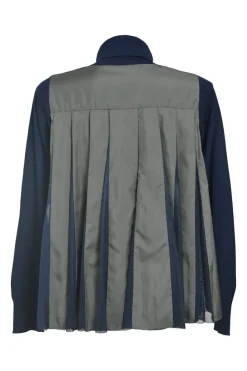 Navy wool mixed-media turtleneck pullover swing-style sweater with pleated back