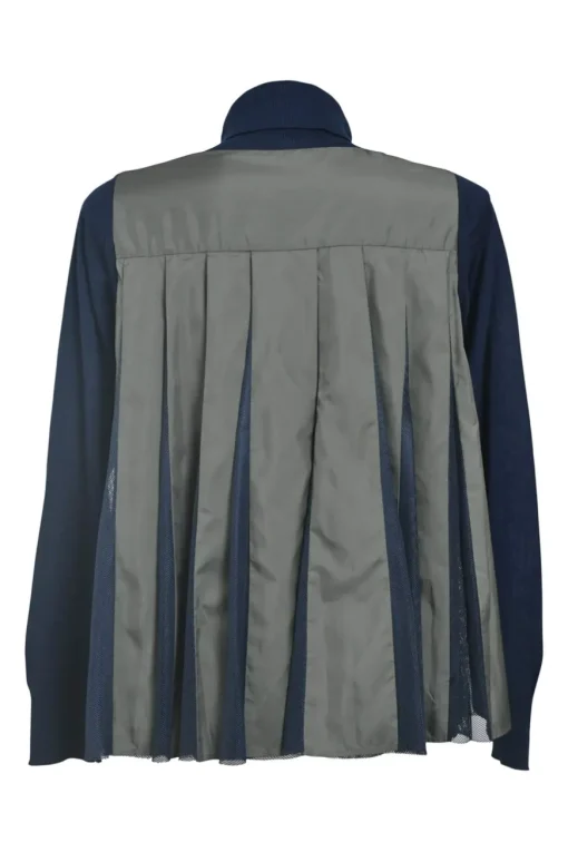 Navy wool mixed-media turtleneck pullover swing-style sweater with pleated back