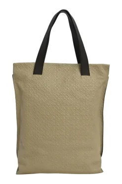 Neutral anagram-embossed leather tote with detachable shoulder strap