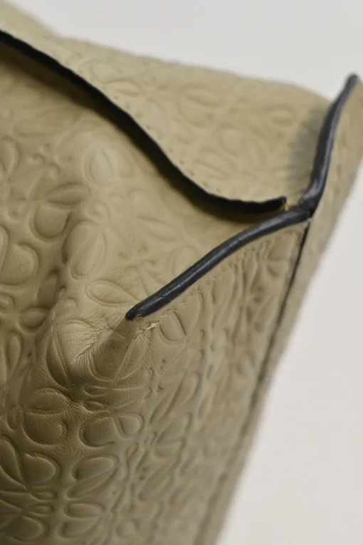 Neutral anagram-embossed leather tote with detachable shoulder strap