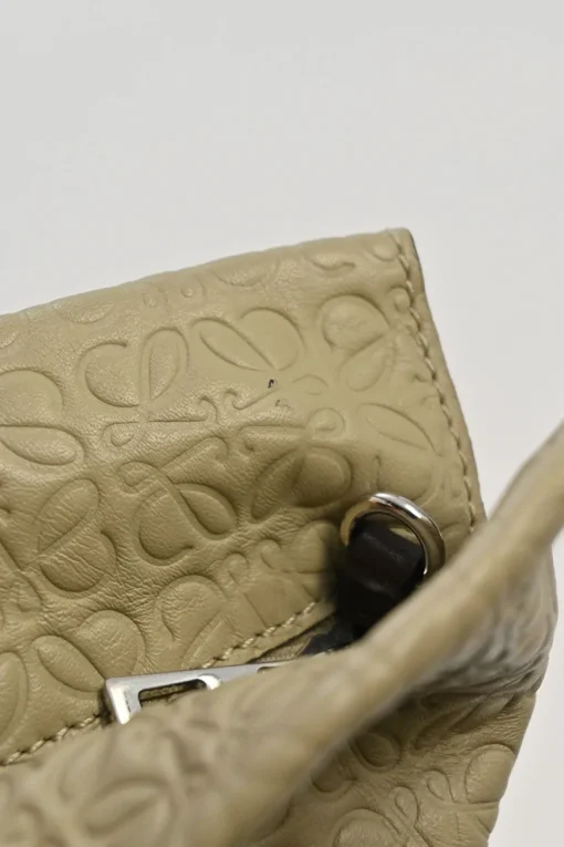 Neutral anagram-embossed leather tote with detachable shoulder strap