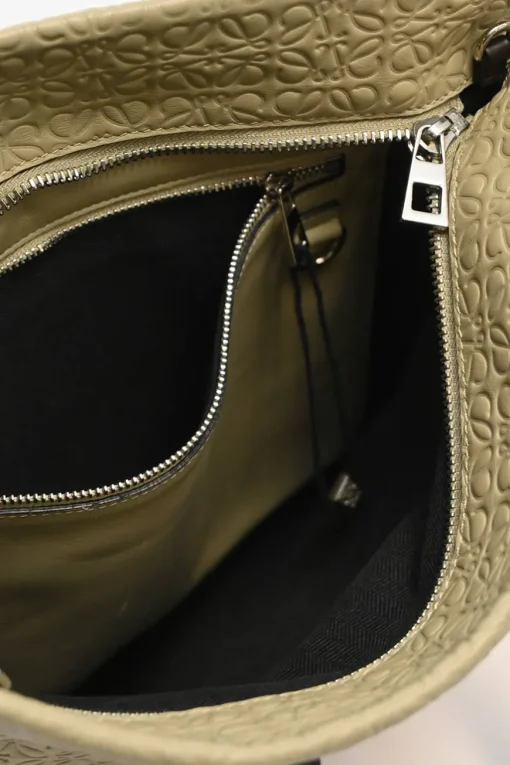 Neutral anagram-embossed leather tote with detachable shoulder strap