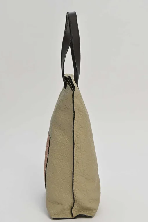 Neutral anagram-embossed leather tote with detachable shoulder strap