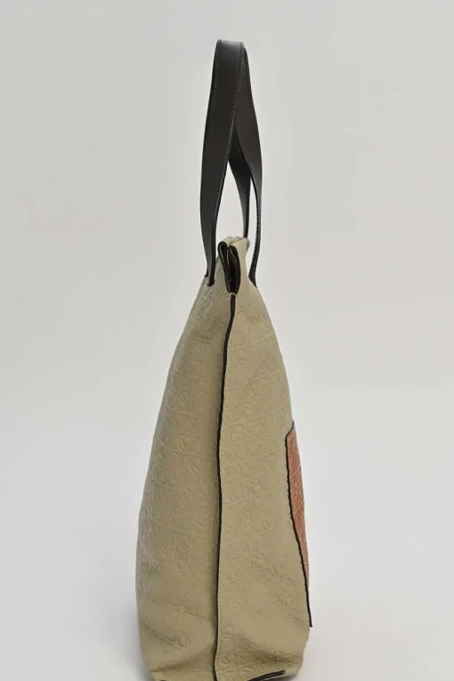 Neutral anagram-embossed leather tote with detachable shoulder strap