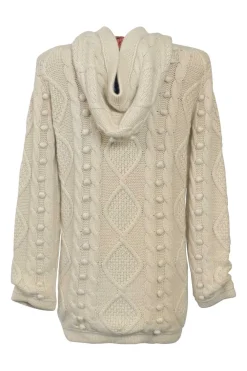Neutral cable knit hooded zip-up cardigan with show frog button detailing at centre front