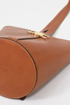 Neutral calfskin leather Bucket Triomphe bucket bag with adjustable shoulder strap