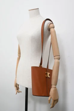 Neutral calfskin leather Bucket Triomphe bucket bag with adjustable shoulder strap