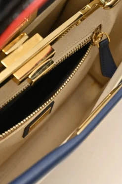 Neutral canvas and leather Peekaboo Iconic satchel with turnlock fastening and detachable shoulder strap
