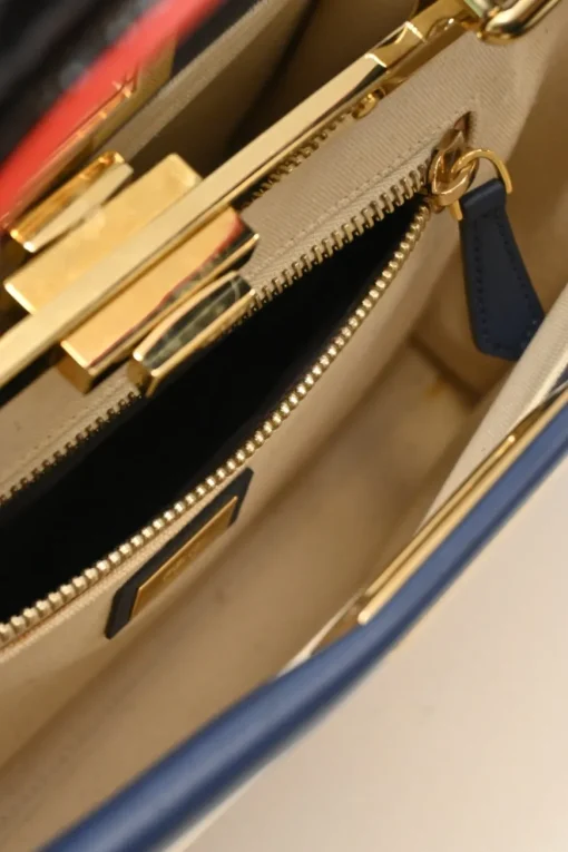 Neutral canvas and leather Peekaboo Iconic satchel with turnlock fastening and detachable shoulder strap