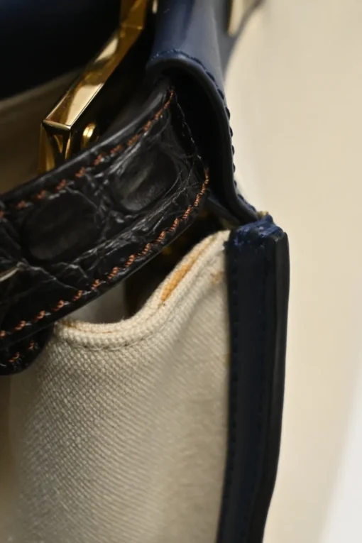 Neutral canvas and leather Peekaboo Iconic satchel with turnlock fastening and detachable shoulder strap