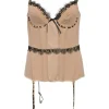 Neutral lace-trimmed polyester bustier garter tank top with corset-style interior boning