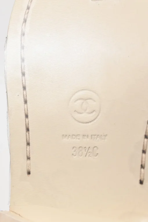 Nude brushed calfskin loafers featuring silver-finish metal logo lettering on heel