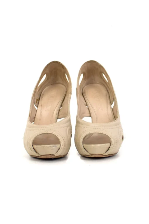 Nude leather peep-toe high-heel with cutout details and embroidered accents