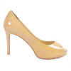 Nude patent leather peep toe platform pumps