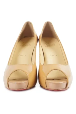 Nude patent leather peep toe platform pumps