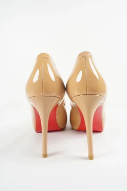Nude patent leather peep toe platform pumps