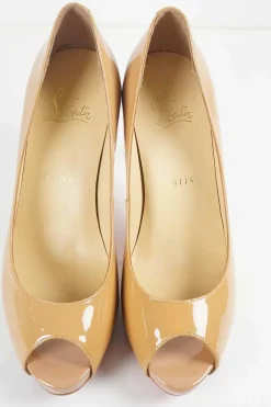 Nude patent leather peep toe platform pumps