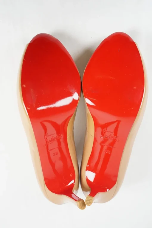 Nude patent leather peep toe platform pumps
