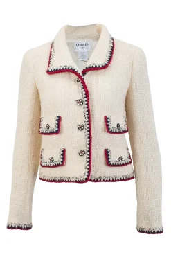 Off white wool silk blend jacket and skirt suit with red and navy knit piping and embellished buttons