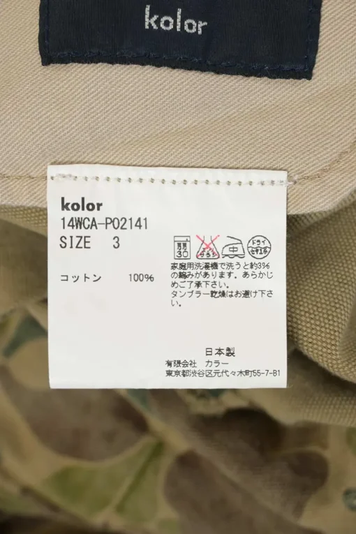 Olive cotton camouflage print pull-on pleat-front trousers