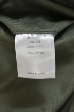 Olive green cotton gabardine relaxed tuck pleat straight-leg chinos with drawstring waist