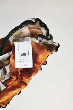 Orange and black paneled polyamide mesh second-skin Hot Wok turtleneck top with lettuce hem