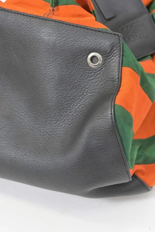 Orange and green Rugby-striped canvas 'Anton' convertible backpack featuring black calf leather trim with debossed Anagram motif