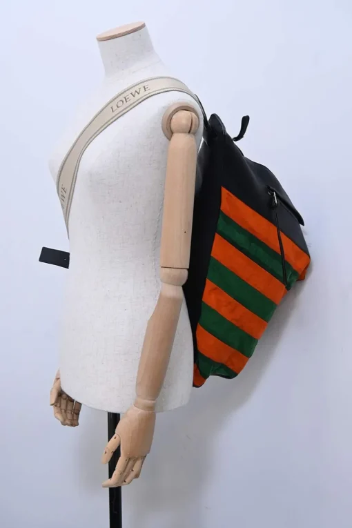 Orange and green Rugby-striped canvas 'Anton' convertible backpack featuring black calf leather trim with debossed Anagram motif